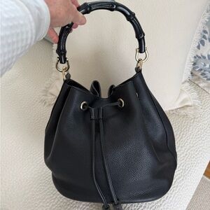 Gucci Black tumbled Leather Bucket Bag , bamboo handle goldchain shoulder strap.